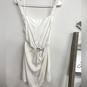 White linen mini dress with open back